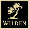 The Wilden Logo with yellow-gold lettering on a square black background and gold borders with a tree in the middle.